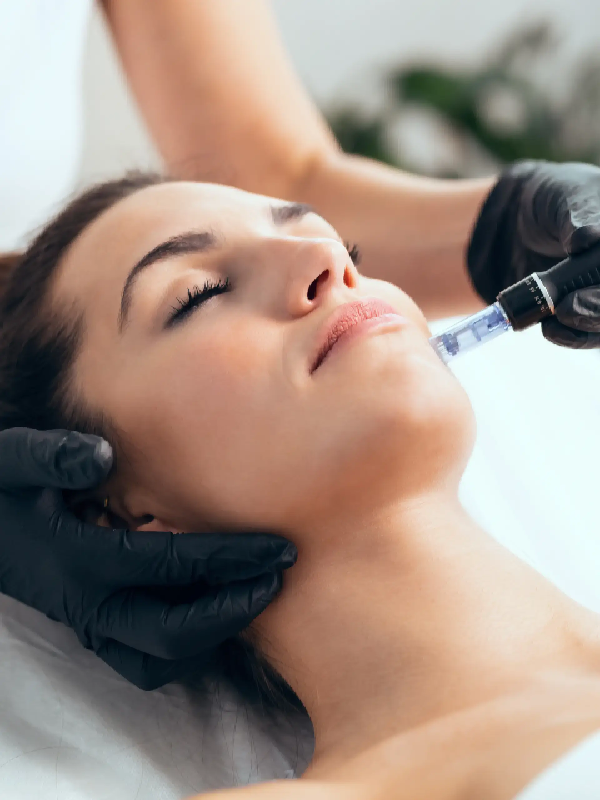 a woman receiving a botox injection